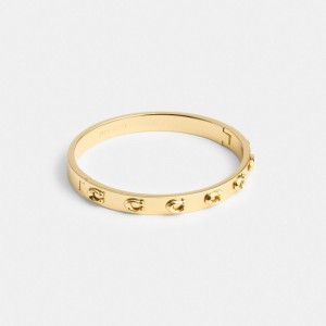 Women Coach Pegged Signature Hinged Bangle Bangles Gold | PH_CH72458